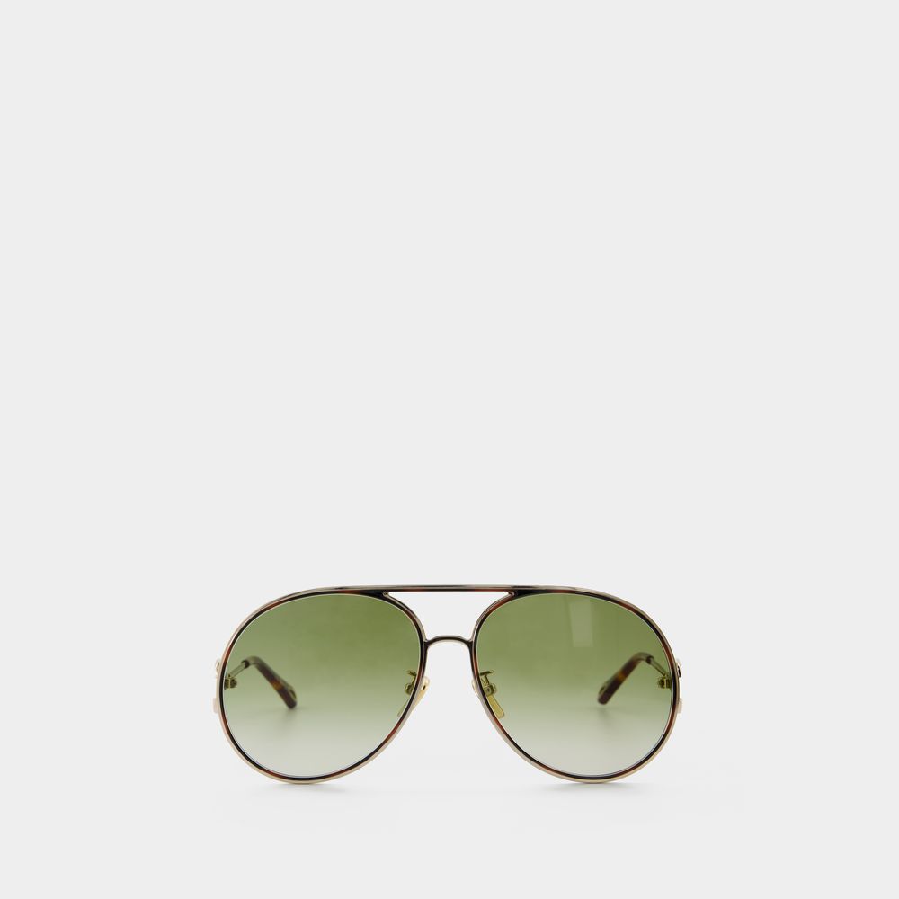sonnenbrille-aus-metall-goldfarbend-grun