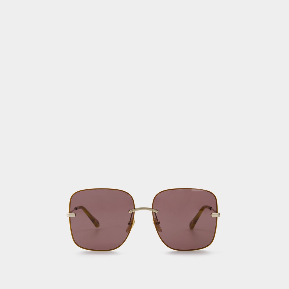 sonnenbrille-aus-metall-goldfarbend-violett