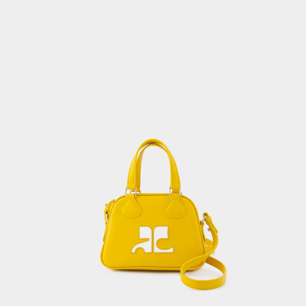 Shop Courrèges Mini Bowling Handtasche - Courreges - Leder - Gelb In Yellow
