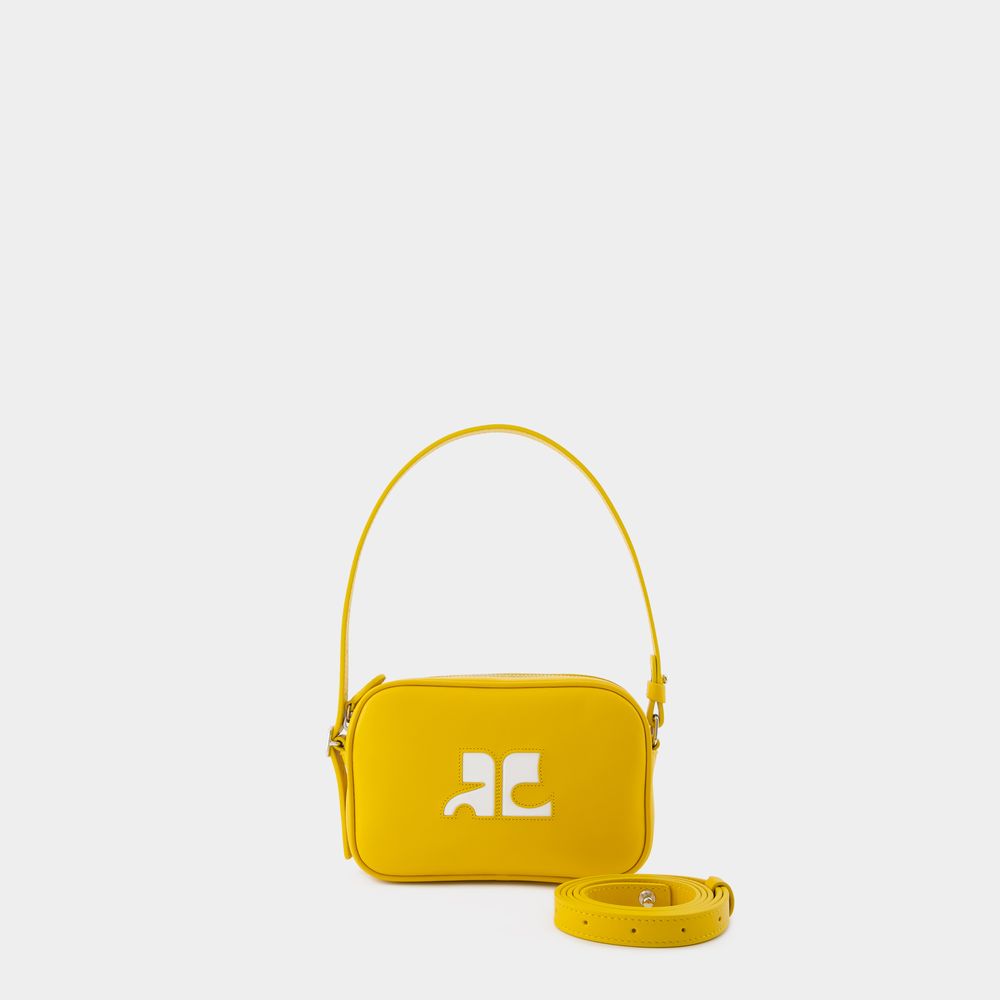 Shop Courrèges Slim Camera Bag - Courreges - Leather - Yellow